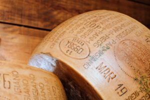 Two large cheese wheels