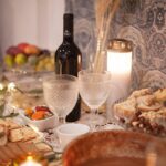 A lavish table set with food and wine for a Portuguese meal