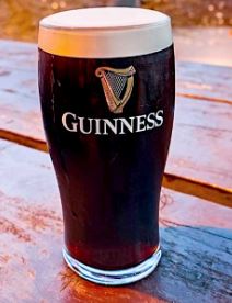 Tall glass of Guinness beer in Ireland