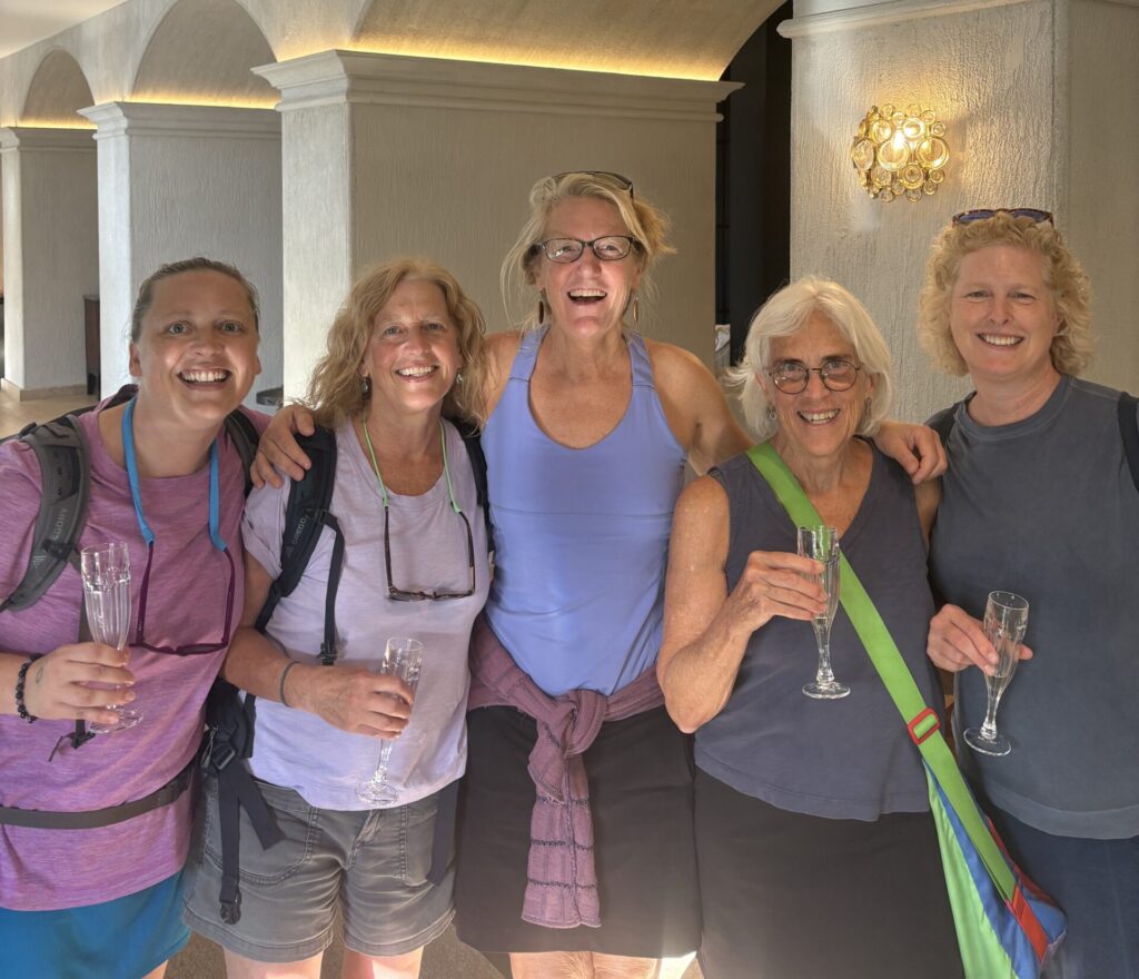 Photo of solo travelers and new friends giving cheers on the Boundless Journeys Croatia & Montenegro tour